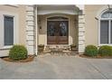 Close-up of the home's impressive front entrance with double doors and stone accents at 2885 Coles Way, Atlanta, GA 30350