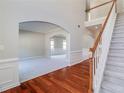 Spacious foyer with hardwood floors and stairs leading to the upper level at 2848 Stockbridge Way, Dacula, GA 30019