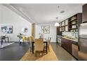 Modern dining room with sleek table, stainless steel appliances, and an open layout with lots of natural light at 170 Boulevard Se # E127, Atlanta, GA 30312