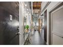 Inviting entryway with a stylish spiral staircase and modern decor leads to the open-concept living space at 170 Boulevard Se # E127, Atlanta, GA 30312