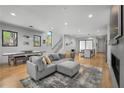 Spacious living room with hardwood floors, modern furniture, and abundant natural light at 1926 Trotti Ne St, Atlanta, GA 30317
