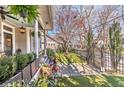 Inviting porch with lush greenery, ceiling fan, swing and stylish decor, perfect for enjoying outdoor living at 1069 Colquitt Ne Ave, Atlanta, GA 30307