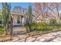 This lovely home has a walkway that leads to a large front porch perfect for relaxing in a beautiful neighborhood at 1069 Colquitt Ne Ave, Atlanta, GA 30307