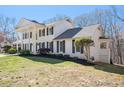 Picturesque home featuring well-maintained lawn and classic architecture, a perfect blend of style and comfort at 5430 Burdette Se Rd, Mableton, GA 30126
