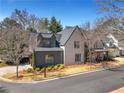 Charming two-story brick home with manicured front yard, offering great curb appeal at 2620 Middle Coray Cir, Marietta, GA 30066