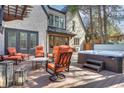 Relaxing backyard deck area with a hot tub, seating, and a pergola for outdoor enjoyment at 2620 Middle Coray Cir, Marietta, GA 30066