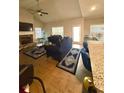 Spacious living room with hardwood floors, a fireplace, and vaulted ceilings at 8325 Loch Lomand Ln, Winston, GA 30187