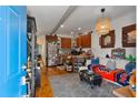 Inviting living room flows into the kitchen, with hardwood floors and modern décor at 109 Chester Se Ave, Atlanta, GA 30316