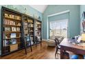Inspiring office with a large bookcase, natural light, and comfortable seating at 129 Euharlee 5 Forks Rd, Euharlee, GA 30145