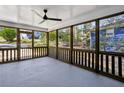 Spacious screened in porch with gorgeous wood trim; a great place to relax and enjoy nature at 621 Spruce Dr, Stone Mountain, GA 30083