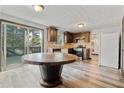 Eat-in kitchen with modern appliances, wood cabinets and exterior access at 2224 Bridle Ct, Norcross, GA 30071