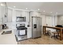Modern kitchen equipped with stainless steel appliances, sleek countertops, and ample cabinet space at 215 Piedmont Ne Ave # 2103, Atlanta, GA 30308