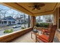 Charming front porch with rocking chairs and a view of the quiet residential street at 434 Euclid Ne Ter, Atlanta, GA 30307