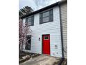 A townhouse with gray shutters and a vibrant red front door at 3505 Miller St # D, Lithia Springs, GA 30122
