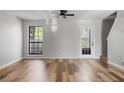 Inviting living room showcasing hardwood floors, neutral paint, and natural light at 3505 Miller St # D, Lithia Springs, GA 30122