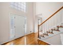 Bright foyer with hardwood floors and a staircase at 434 Westchester Way, Canton, GA 30115