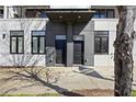 Modern townhome entrance with stylish doors and contemporary architectural details at 223 16Th Nw St # 8, Atlanta, GA 30363