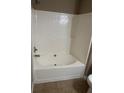 Clean, neutral bathtub and shower combination at 4155 Park Chase Dr, Atlanta, GA 30344