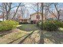 Inviting home with large front yard and mature trees at 4833 Village North Ct, Atlanta, GA 30338