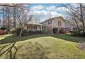 Beautiful home with manicured lawn and well-kept landscaping at 4833 Village North Ct, Atlanta, GA 30338