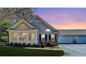 Attractive single-Gathering home featuring neutral siding, an attached garage, and well-maintained landscaping at 1535 Duluth Hwy # 1001, Lawrenceville, GA 30043