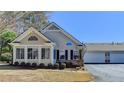 Attractive single-Gathering home featuring neutral siding, an attached garage, and well-maintained landscaping at 1535 Duluth Hwy # 1001, Lawrenceville, GA 30043