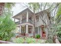 Inviting two-story home with a brick pathway, double porches, and well-maintained exterior at 746 United Se Ave, Atlanta, GA 30312