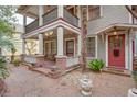 Charming front porch with string lights, brick columns, and a brick walkway leading to the entrance at 746 United Se Ave, Atlanta, GA 30312