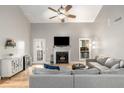 Bright living room with hardwood floors, fireplace, and tall ceilings at 2131 N Forest Trl, Atlanta, GA 30338