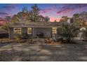 Beautifully landscaped backyard with a stamped concrete patio, ideal for entertaining guests at 284 Regal Dr, Lawrenceville, GA 30046