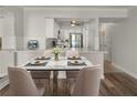 Bright dining area features a marble table, seating for four, and adjoins the kitchen at 2870 Pharr Court South Nw # 1202, Atlanta, GA 30305
