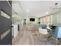 The entry leads into a well-lit open-concept living space, flowing from dining to living room and a modern kitchen at 2047 Boulderview Se Dr, Atlanta, GA 30316