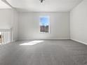 Spacious bonus room with lots of natural light, perfect for a home office at 5216 Sweet Air Ln, Stone Mountain, GA 30088