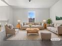 Bright living room with a large window and neutral decor at 5216 Sweet Air Ln, Stone Mountain, GA 30088