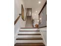Elegant staircase with wooden treads and white risers at 45 Honour Nw Ave, Atlanta, GA 30305