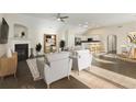 Bright living room features a fireplace, vaulted ceiling, and connects to an open concept kitchen at 4071 Cottage Oaks Dr # 3, Acworth, GA 30101