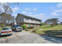 A lovely duplex with a spacious lawn and an inviting driveway at 1143 Forest Villa Nw Dr, Conyers, GA 30012