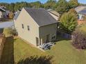 Spacious backyard with a patio area, perfect for outdoor dining and entertaining at 4050 Ironwood Dr, Atlanta, GA 30349