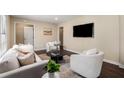 Cozy living room featuring modern decor, comfortable seating, and a warm and inviting atmosphere at 2600 Cohassett Ct, Decatur, GA 30034