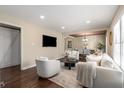 Bright and airy living room featuring hardwood floors, neutral colors, and ample natural light at 2600 Cohassett Ct, Decatur, GA 30034
