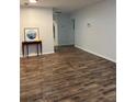 A living room featuring new hardwood floors, neutral wall colors, and plenty of natural light at 1076 Grant Se Way, Atlanta, GA 30315