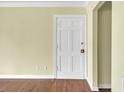Entryway of home featuring wood floors and a white door at 2345 Henderson Mill Ne Rd # 1, Atlanta, GA 30345