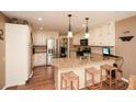 Well-appointed kitchen with granite countertops, stainless steel appliances, and a breakfast bar for casual dining at 120 Mill Creek Ct, Acworth, GA 30101