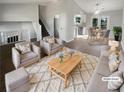 Bright living room with lots of natural light has cozy seating, neutral colors and an open floor plan at 4665 Garden Hills Dr, Stone Mountain, GA 30083