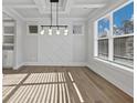 Dining room with bright natural light, decorative walls, and recessed lights at 4190 Hosch Reserve Dr, Buford, GA 30519