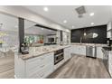 Spacious kitchen with granite countertops, stainless steel appliances, and a large island at 10070 Timberstone Rd, Johns Creek, GA 30022