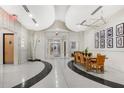 Elegant lobby with modern decor, stylish seating, and sleek terrazzo flooring at 860 Peachtree Ne St # 1511, Atlanta, GA 30308