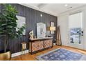 Stylish entryway featuring hardwood floors, decorative console, and a view to the outside at 969 Parsons Sw St, Atlanta, GA 30314