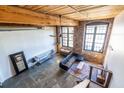 Aerial view of open floor plan in a loft featuring a vaulted ceiling and exposed brick walls at 170 Boulevard Se # 421 H, Atlanta, GA 30312