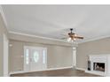 Bright living room with a fireplace, hardwood floors, and a welcoming atmosphere at 2000 Mcconnell Rd, Grayson, GA 30017